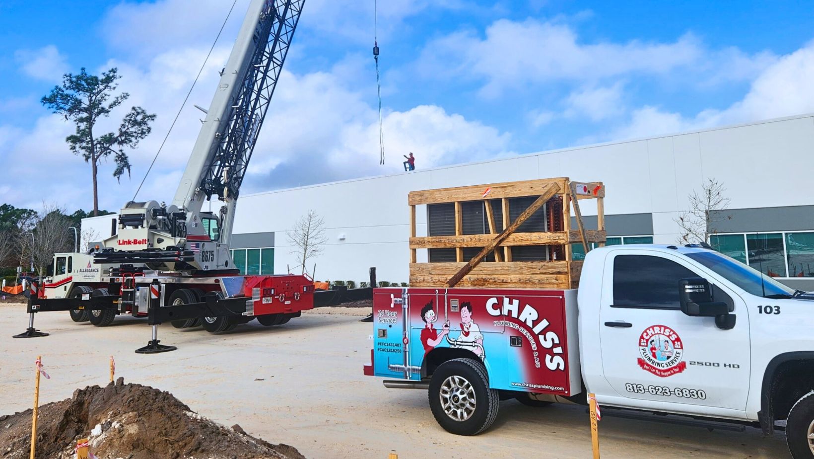 Commercial HVAC services installing rooftop HVAC unit at commercial building by Always There Heating and Air